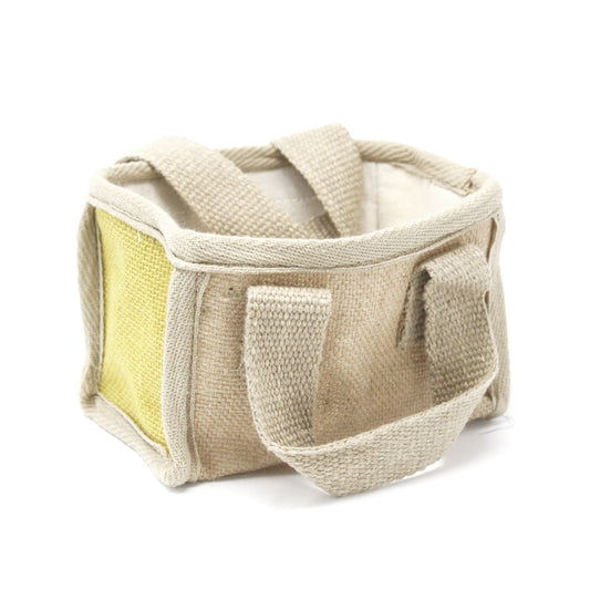 Small olive green woven jute shopping basket with soft handles and cream cotton lining.