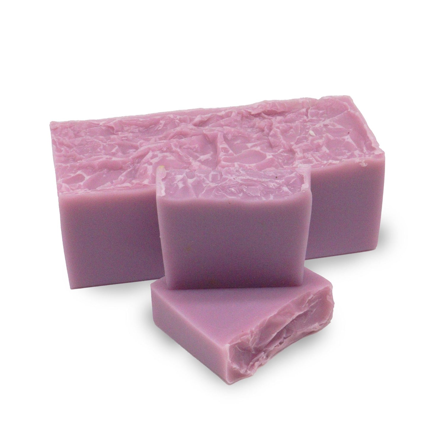 Hand-crafted lavender and coconut soap loaf with a natural, rustic texture and soothing purple and white tones.