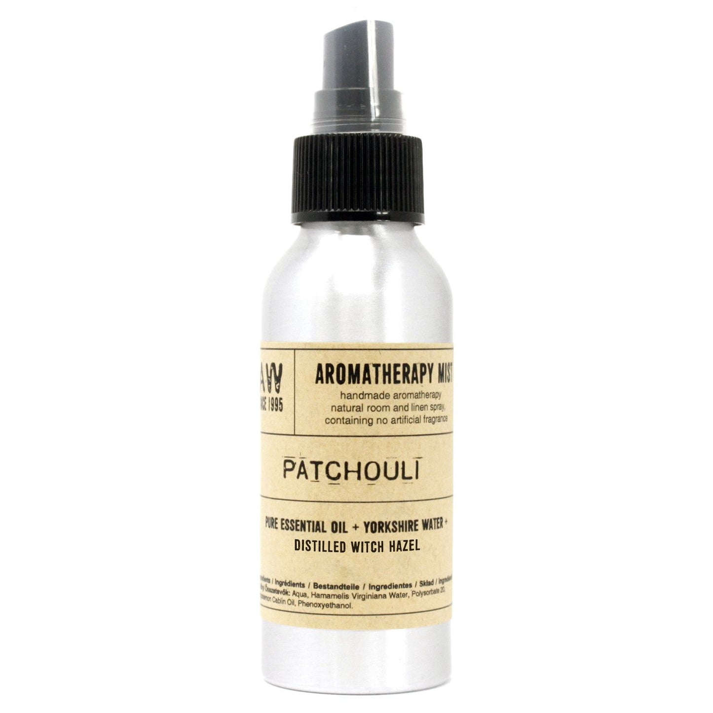 Clear bottle of patchouli essential oil room mist with a minimalist label and spray nozzle.