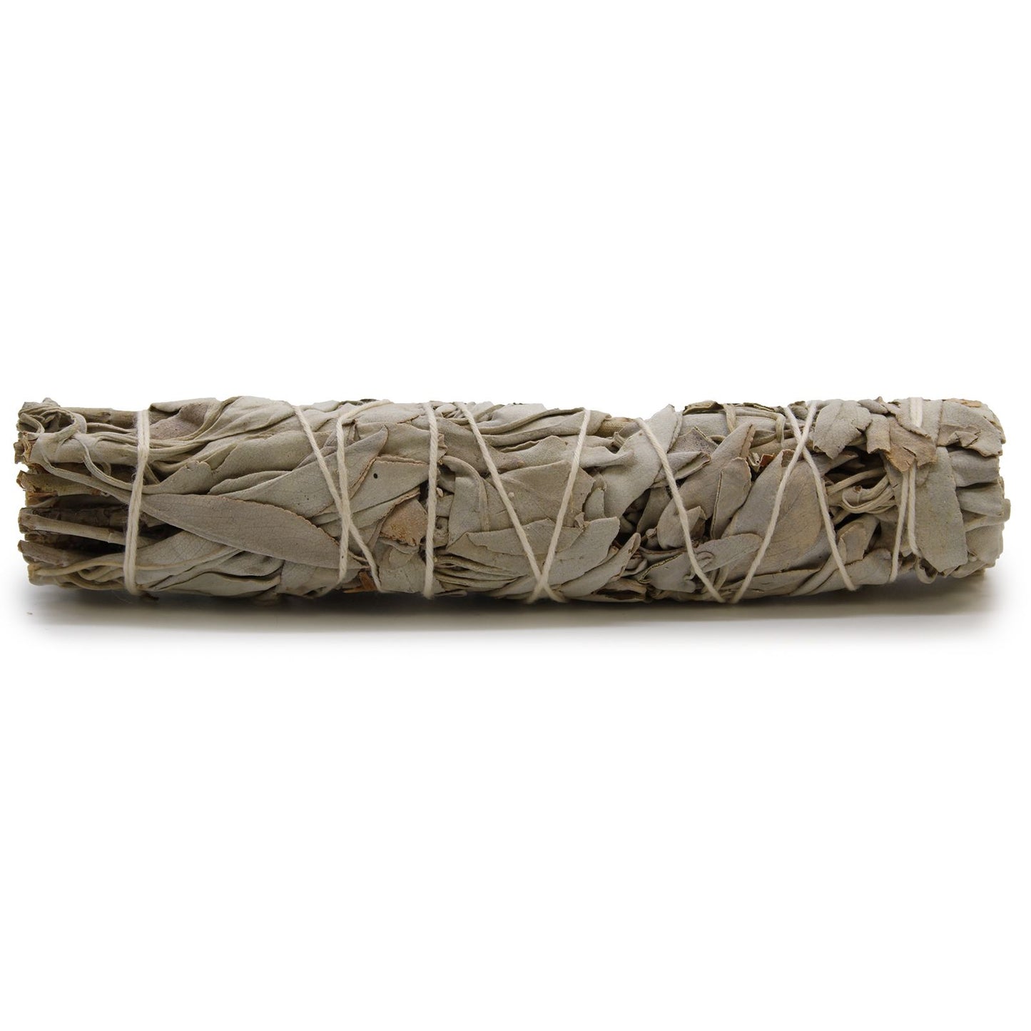 A large bundle of dried white sage leaves tied together with string for smudging and space clearing.