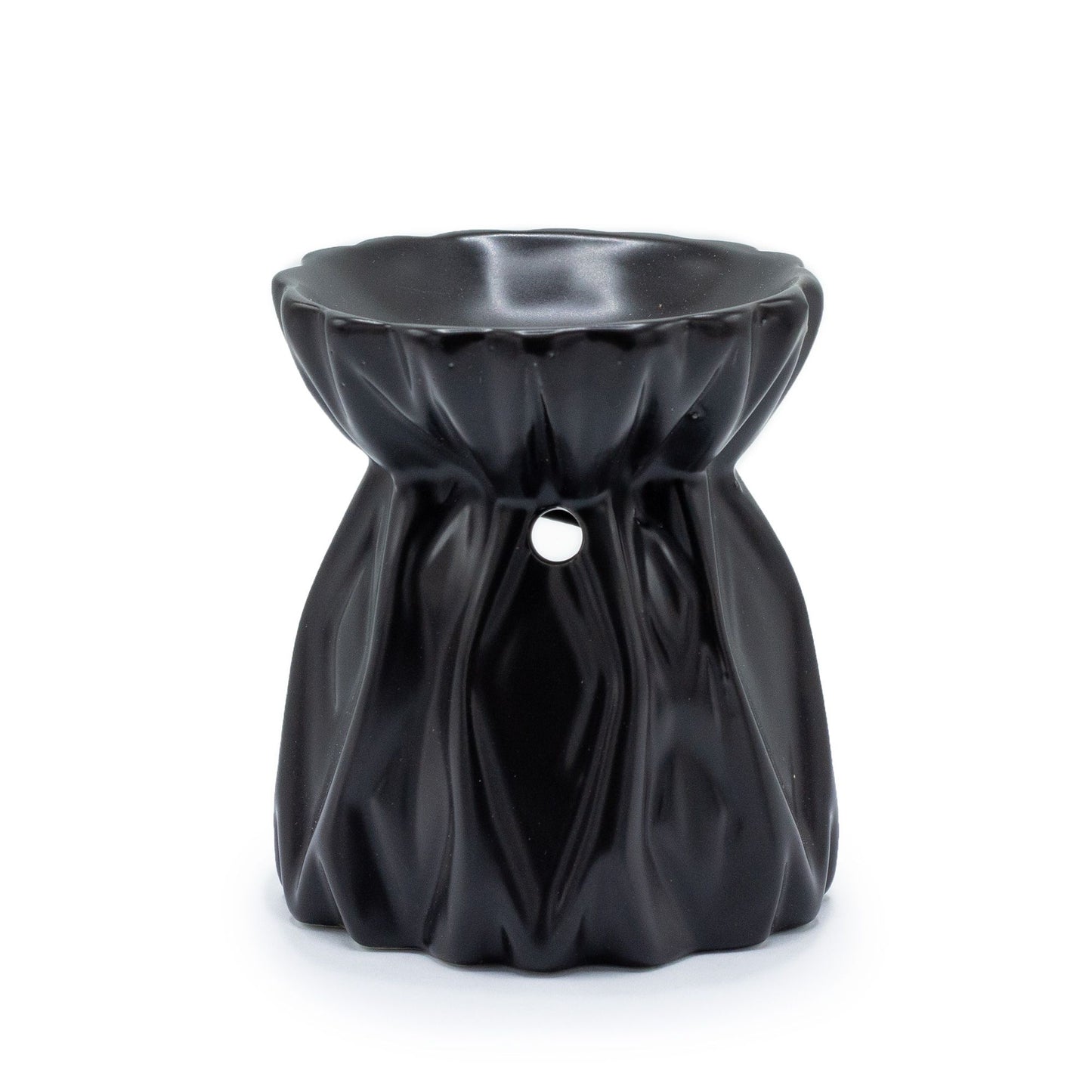 Minimalist black ceramic oil burner with a modern geometric cut-out design and a deep bowl for oils.