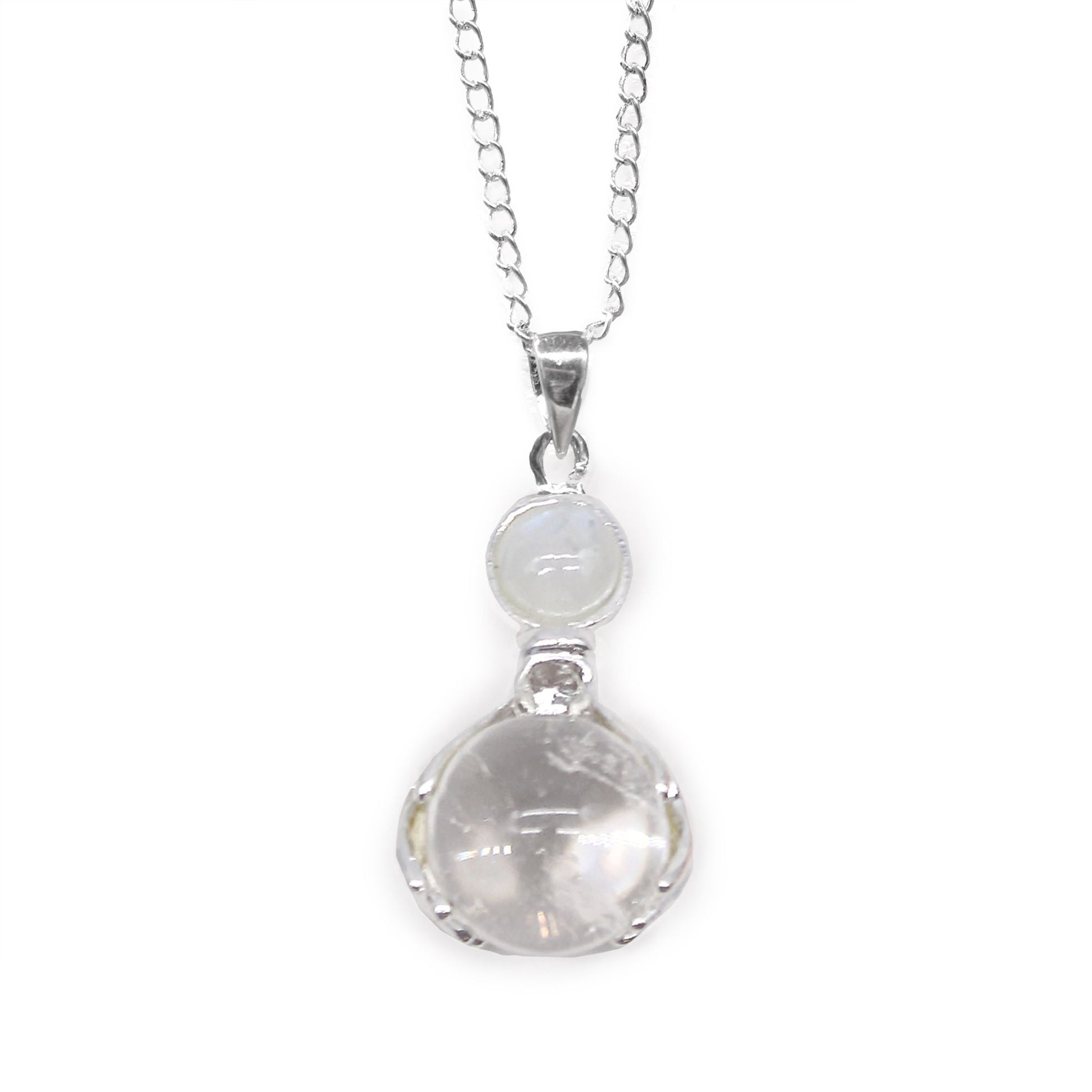 Detailed silver-tone healing hands cradling a clear, polished Rock Quartz gemstone point pendant.