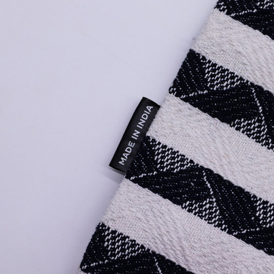Spacious jacquard fabric carryall bag featuring a clean striped pattern and durable woven handles.