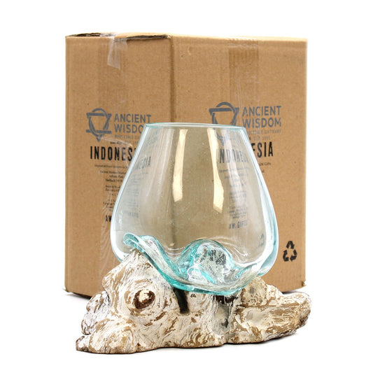 Large hand-blown molten glass bowl slumped over a natural whitewashed wood root base.