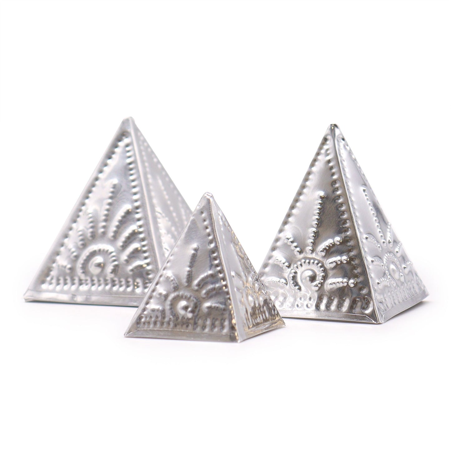 Set of three unpainted wooden pyramid moulds for making custom incense cones on a neutral background.