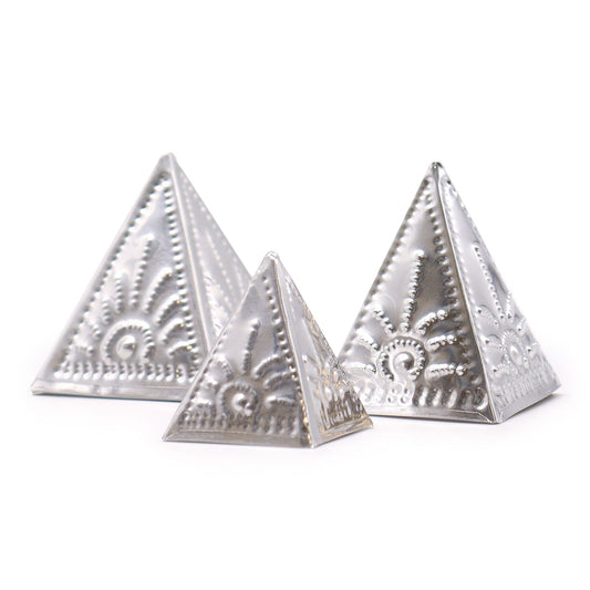 Set of three unpainted wooden pyramid moulds for making custom incense cones on a neutral background.