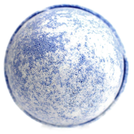 Large round artisanal bath bomb with a textured surface, featuring deep purple and soft cream tones.