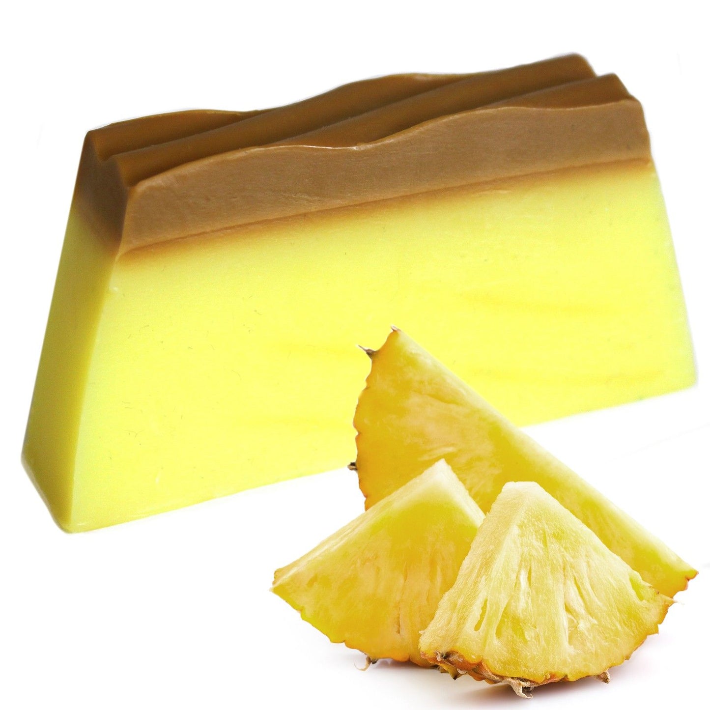 Vibrant yellow artisanal soap loaf with a textured top, reminiscent of fresh tropical pineapple.