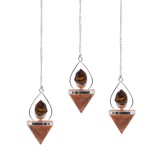 A decorative silver-tone lantern-style pendulum containing sunstone and tigereye gemstone beads.