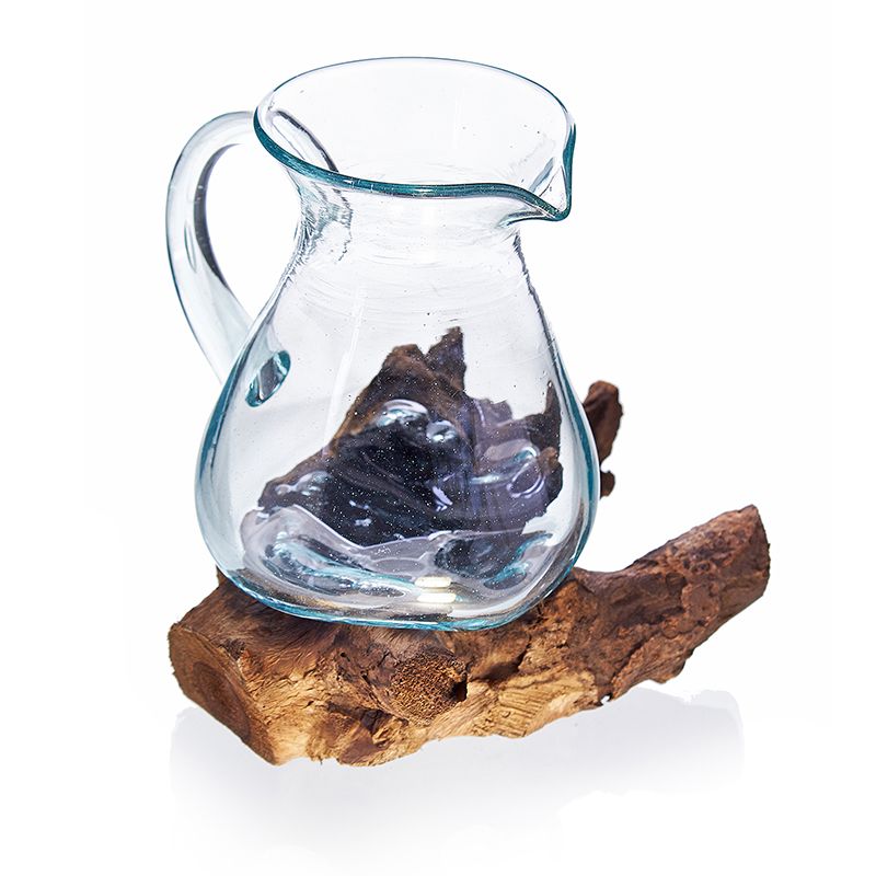 Handmade recycled glass jug uniquely shaped and melted over a natural wood base for a rustic organic look.