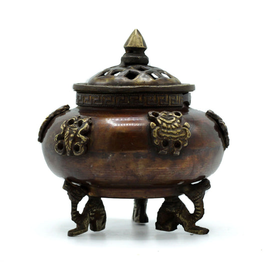 Handcrafted brass Tibetan incense burner pot with standing legs and intricate six-symbol engravings.
