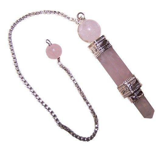 Pointed rose quartz crystal pendulum with a silver link chain and a small pink gemstone bead at the end.