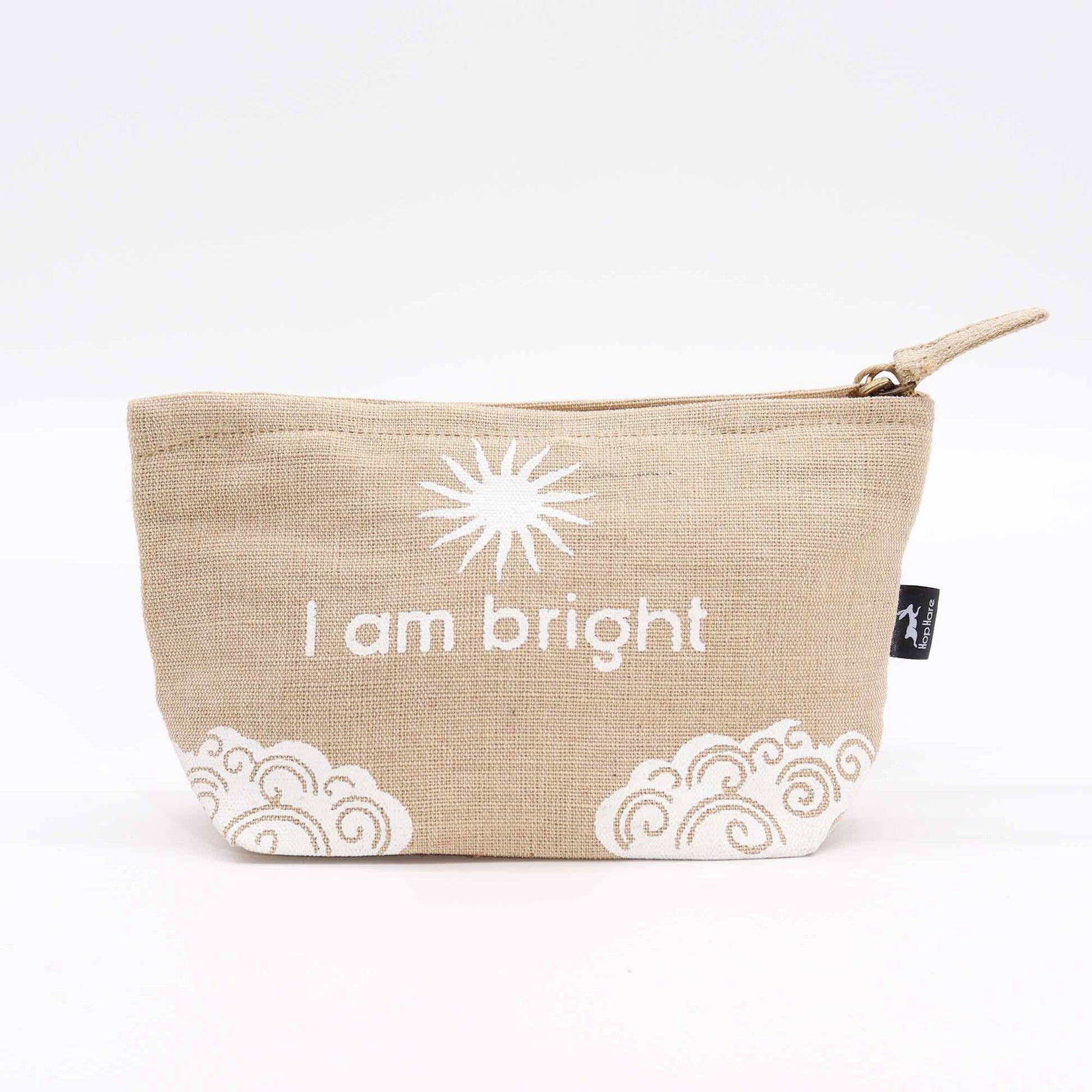 Small natural jute drawstring pouch featuring a printed positive affirmation and decorative sun motif.