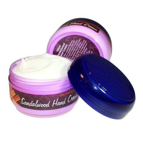 Tube of creamy sandalwood scented hand moisturiser for skin hydration.