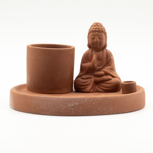 Terracotta style red ceramic incense plate featuring a serene seated Buddha figure for meditation and home ritual.