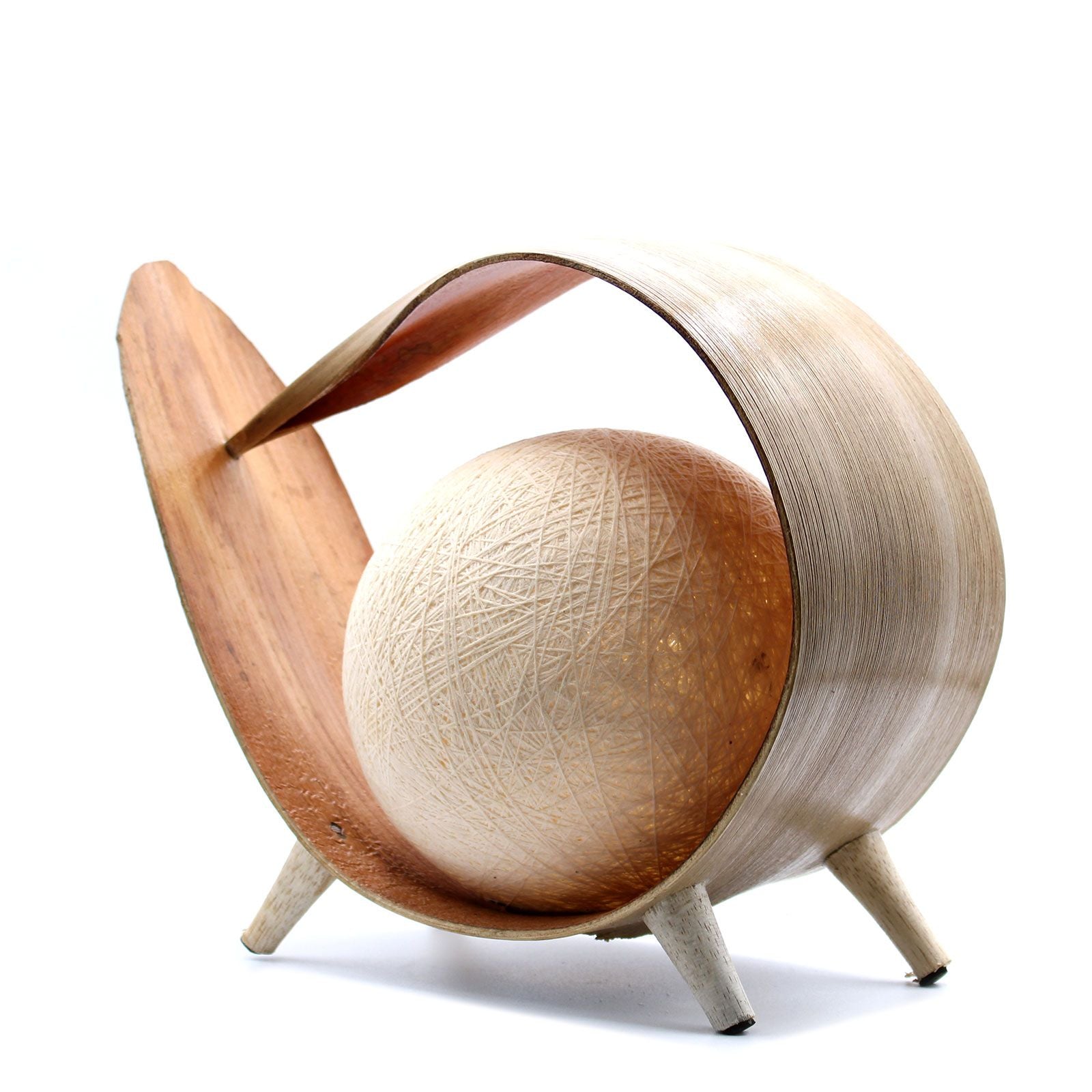 Handcrafted natural coconut leaf lamp with a loop design and a central white cotton ball shade.