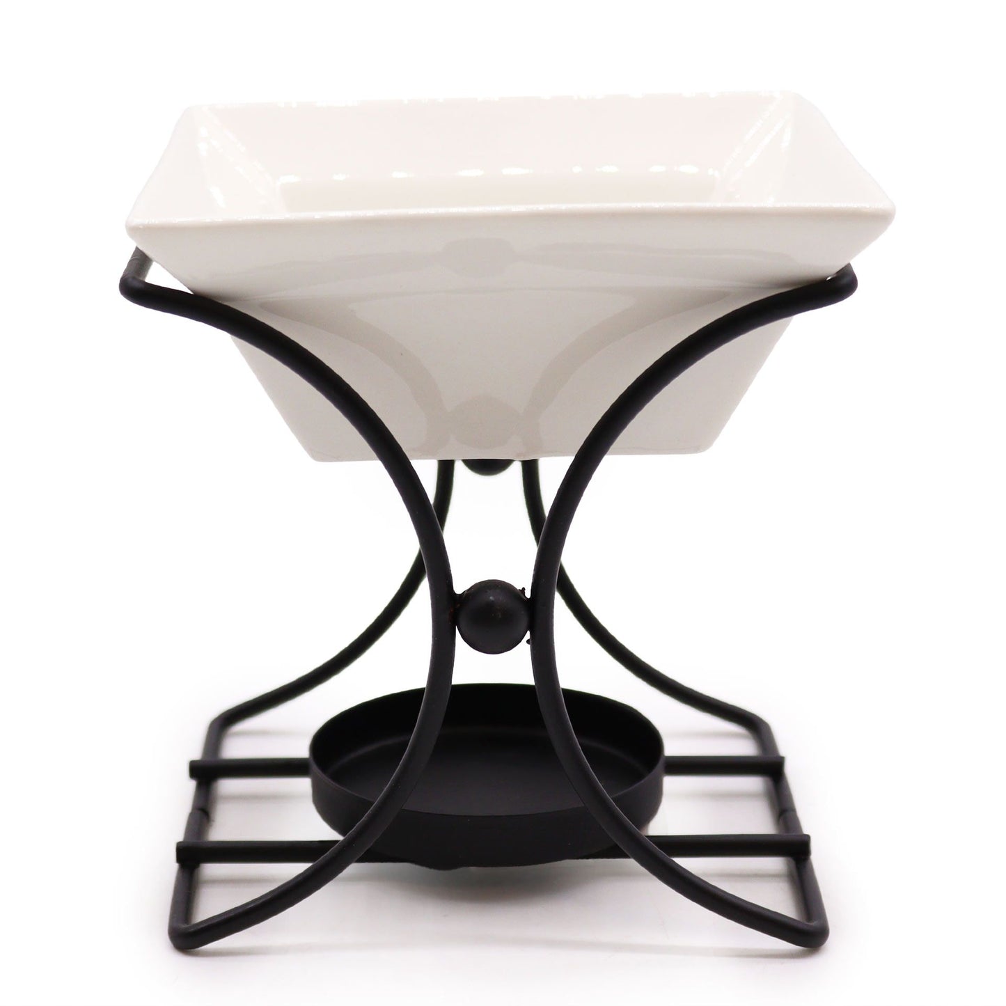 Modern square oil burner featuring a minimalist metal stand and a white ceramic bowl for essential oils.