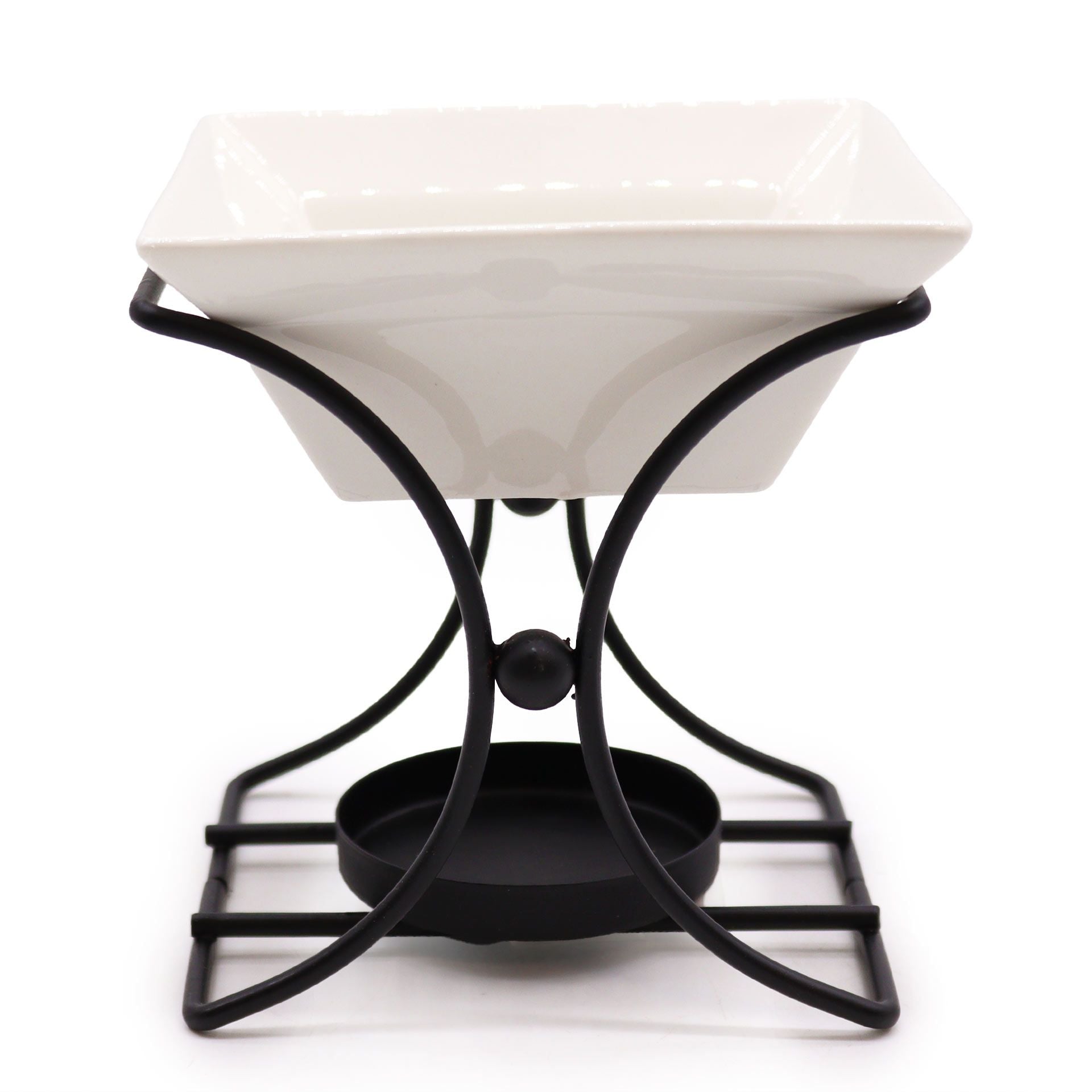 Modern square oil burner featuring a minimalist metal stand and a white ceramic bowl for essential oils.