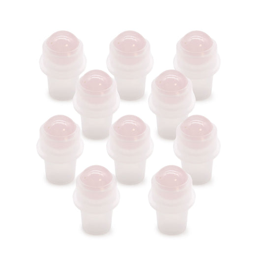 Polished pink rose quartz gemstone roller ball tip for a 5ml essential oil bottle.