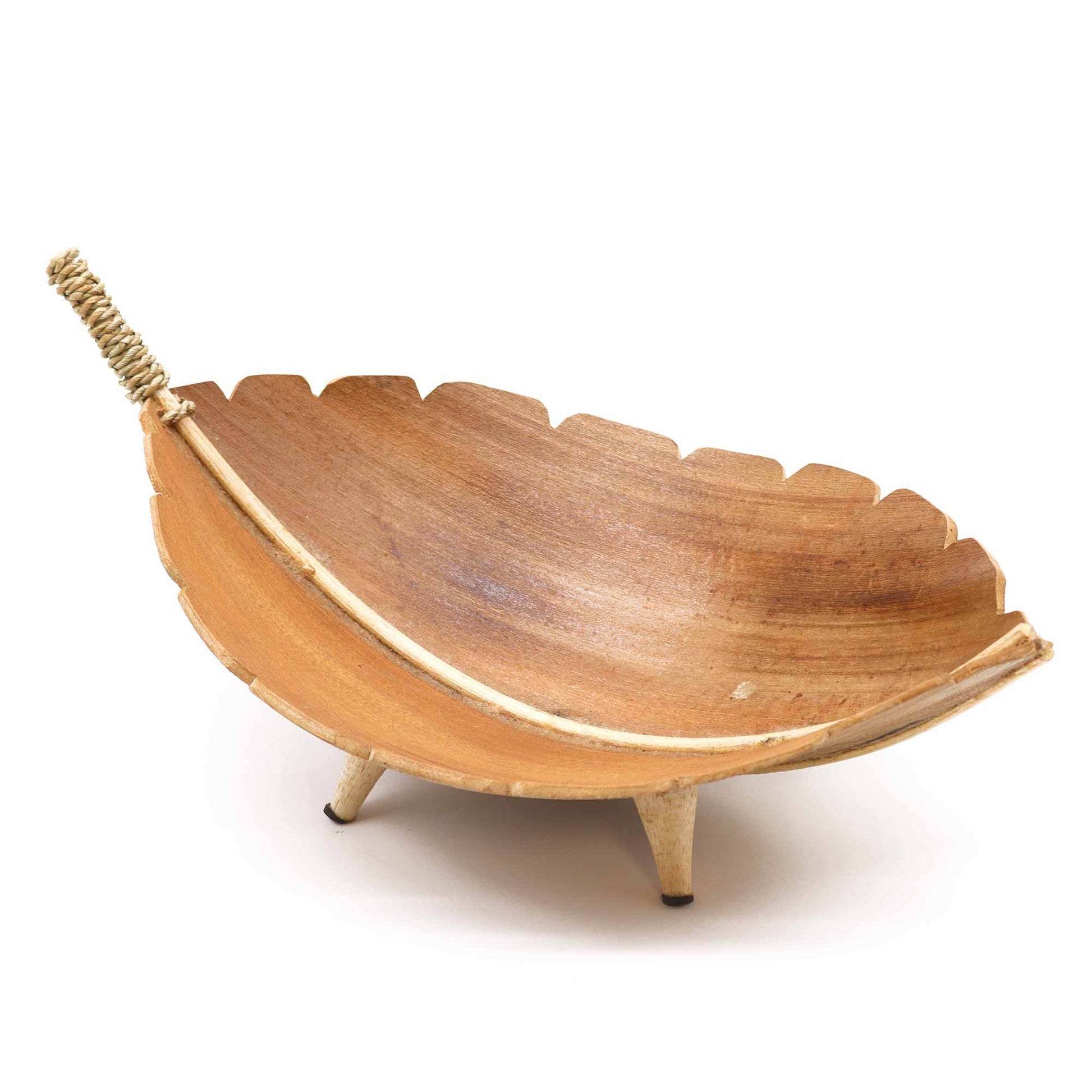 Large natural coconut leaf bowl with visible wood grain texture, ideal for fruit or bread display.