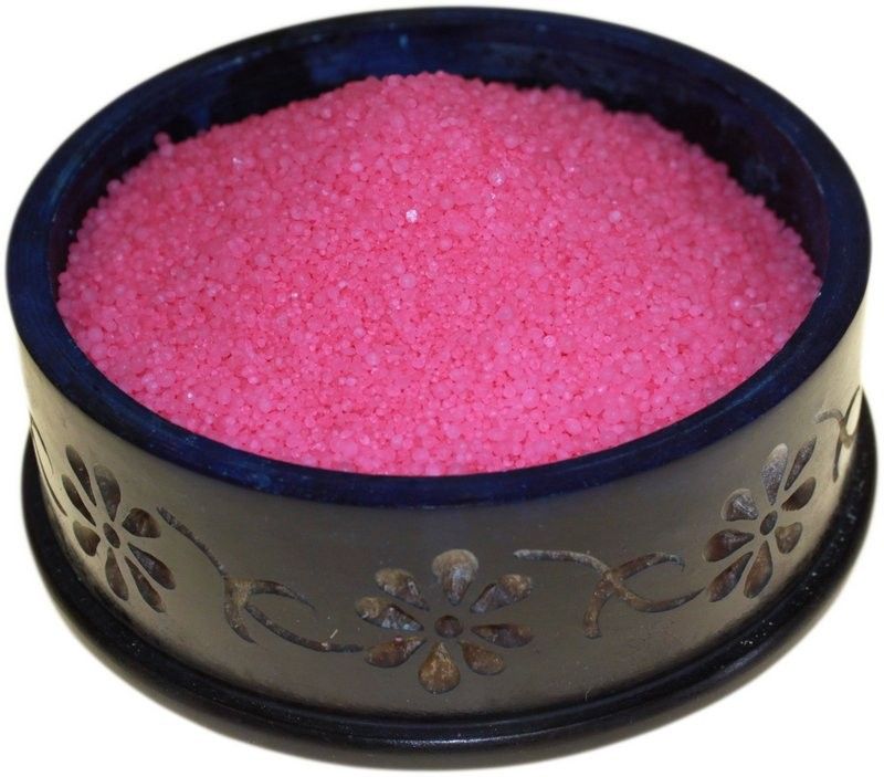 Small vibrant pink simmering granules for an oil burner to create a sweet bubblegum room fragrance.
