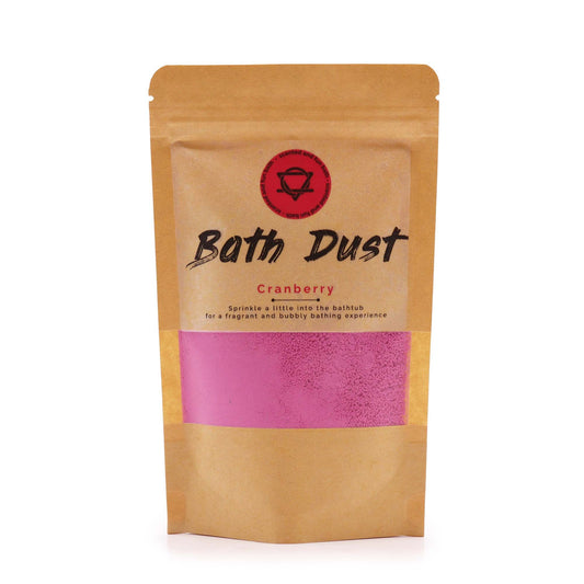 Sparkling pink and red bath dust in a clear bag showing a fine, crystalline texture.