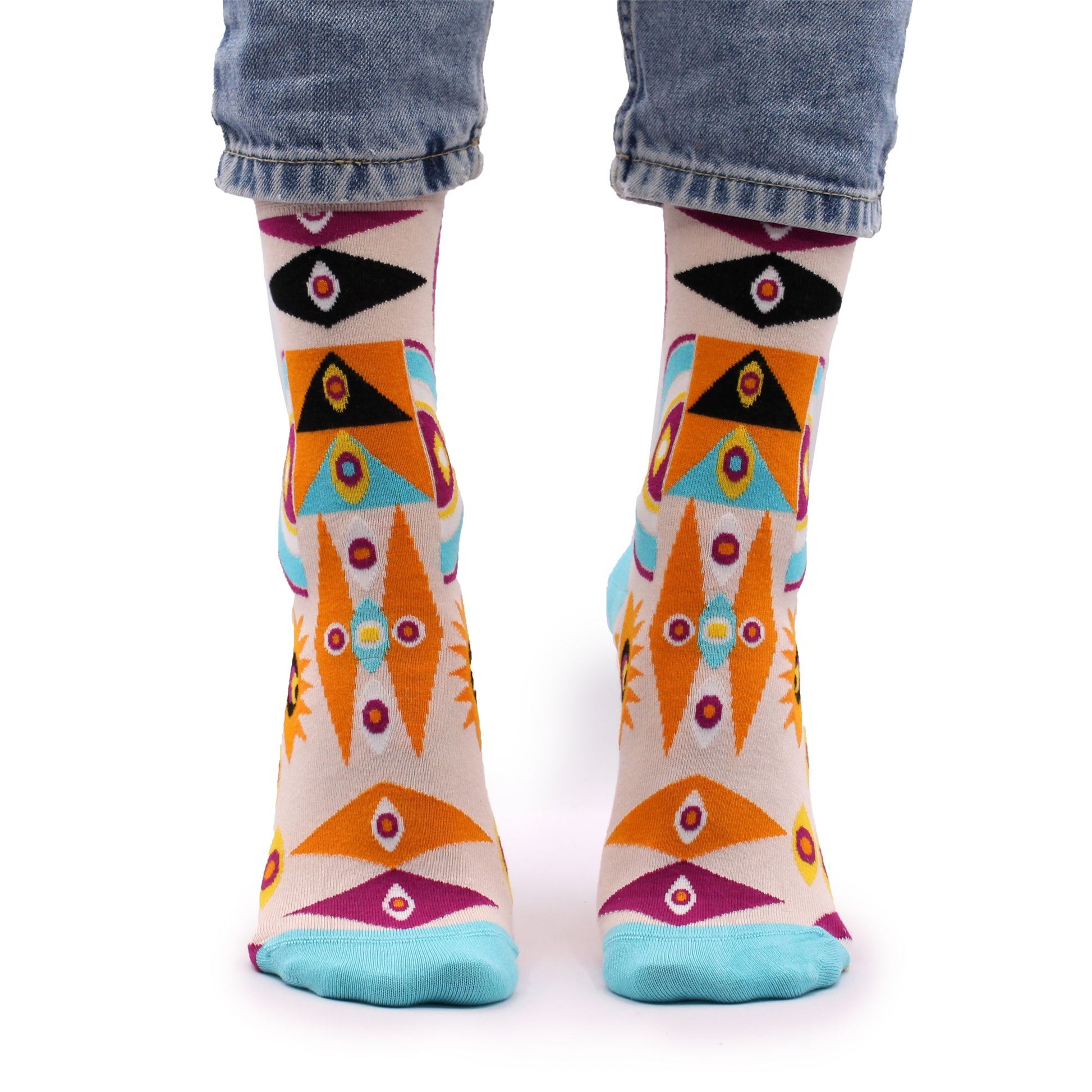 Pair of vibrant bamboo socks featuring a mystical psychedelic evil eye pattern in bold colours.