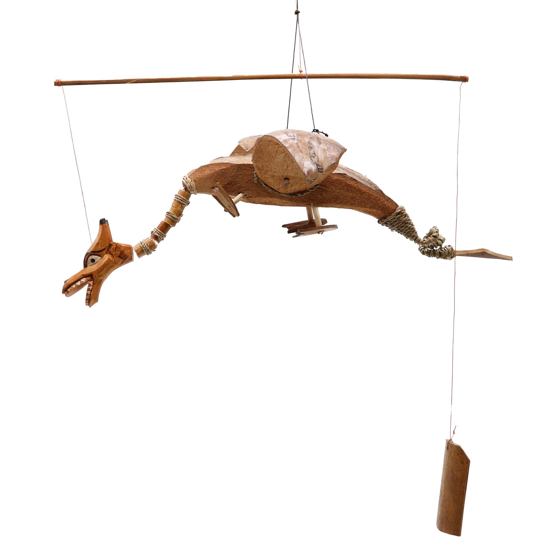 Hand-crafted dragon mobile made from natural coconut shells with a wide wingspan hanging from a hook.