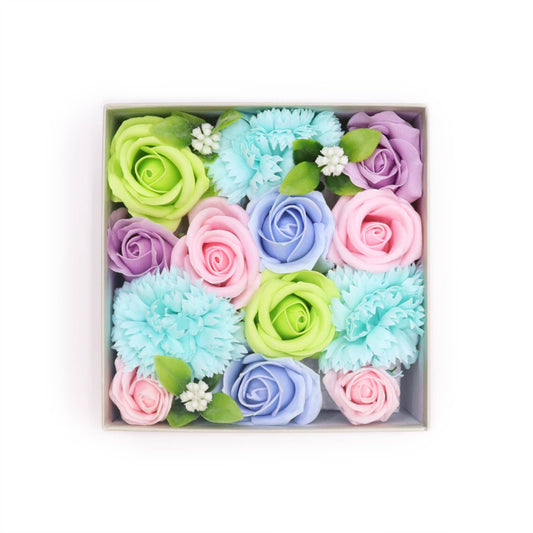 Charming square gift box filled with delicate soap flowers in various shades of blue and white.