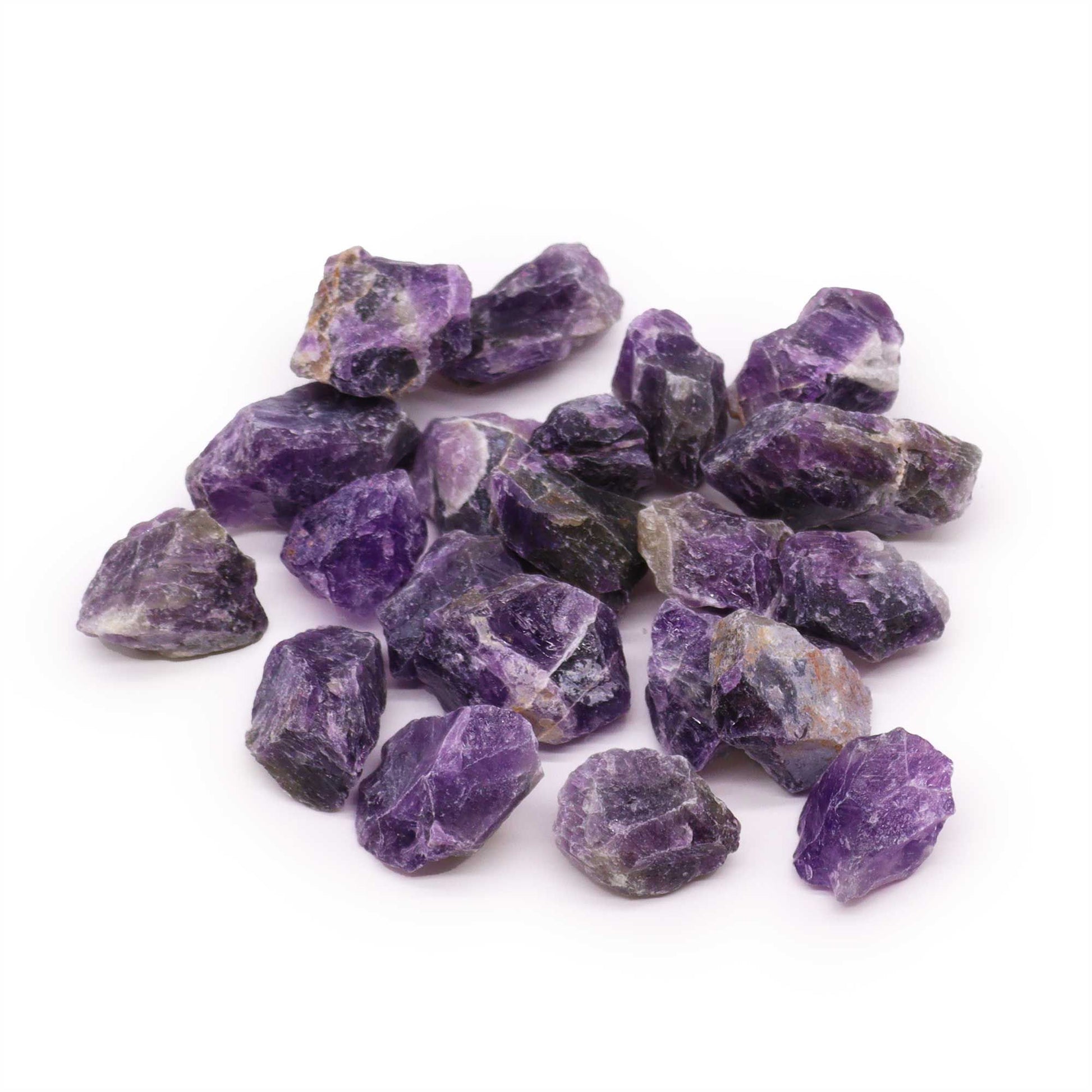 A collection of natural purple raw Amethyst crystal stones in varying sizes and shapes.