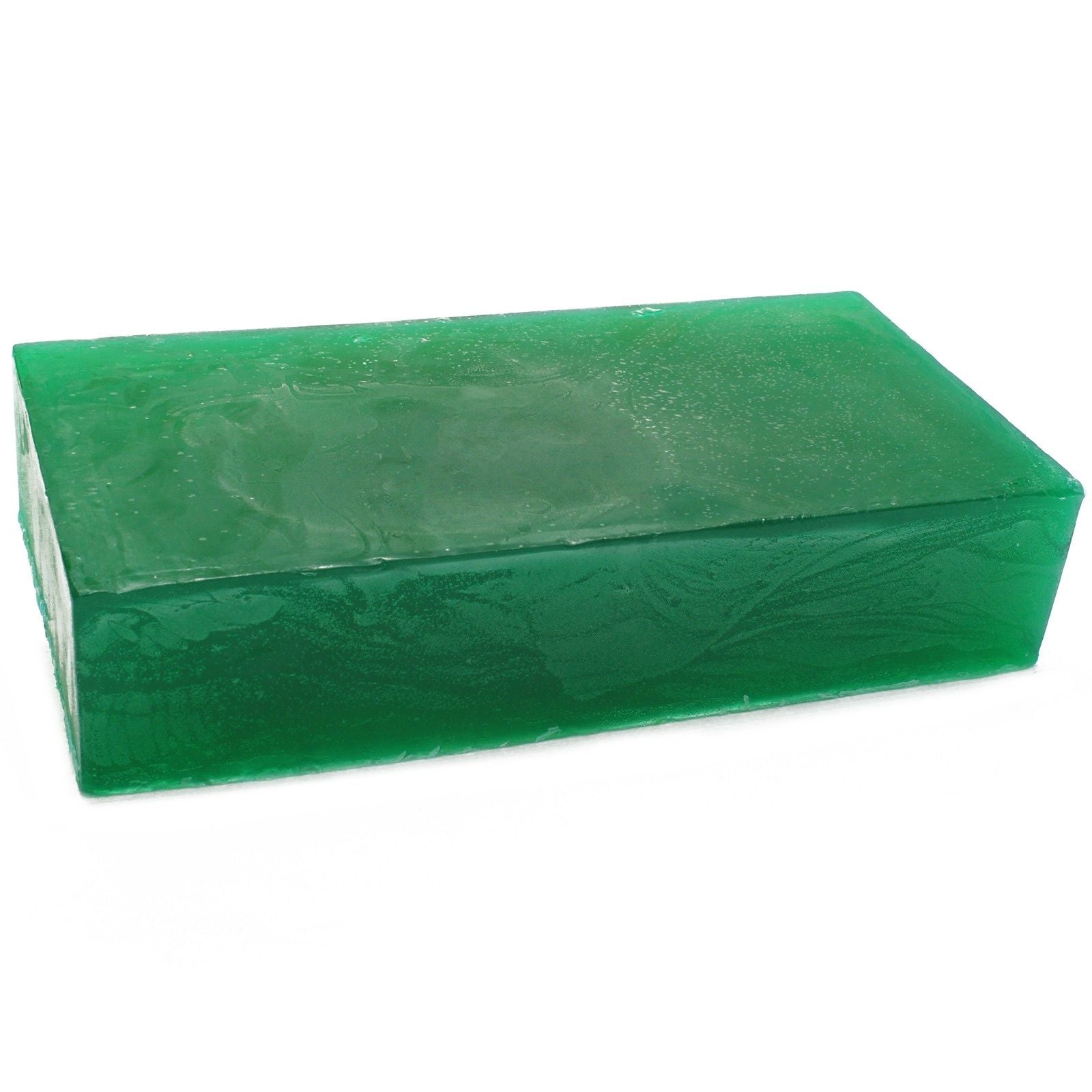Large rectangular artisanal soap loaf with a creamy texture and dried peppermint leaf inclusions on top.