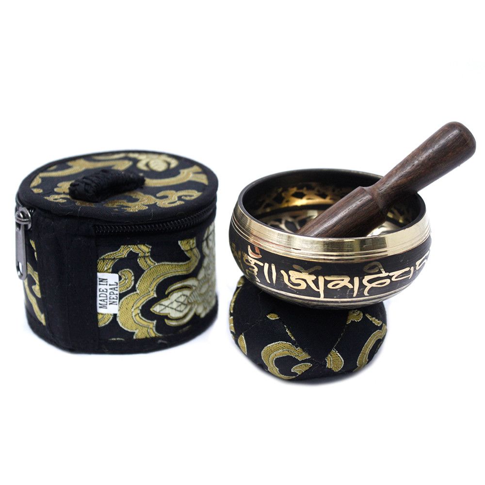 Small black Tibetan singing bowl with a wooden striker and a decorative patterned drawstring pouch.