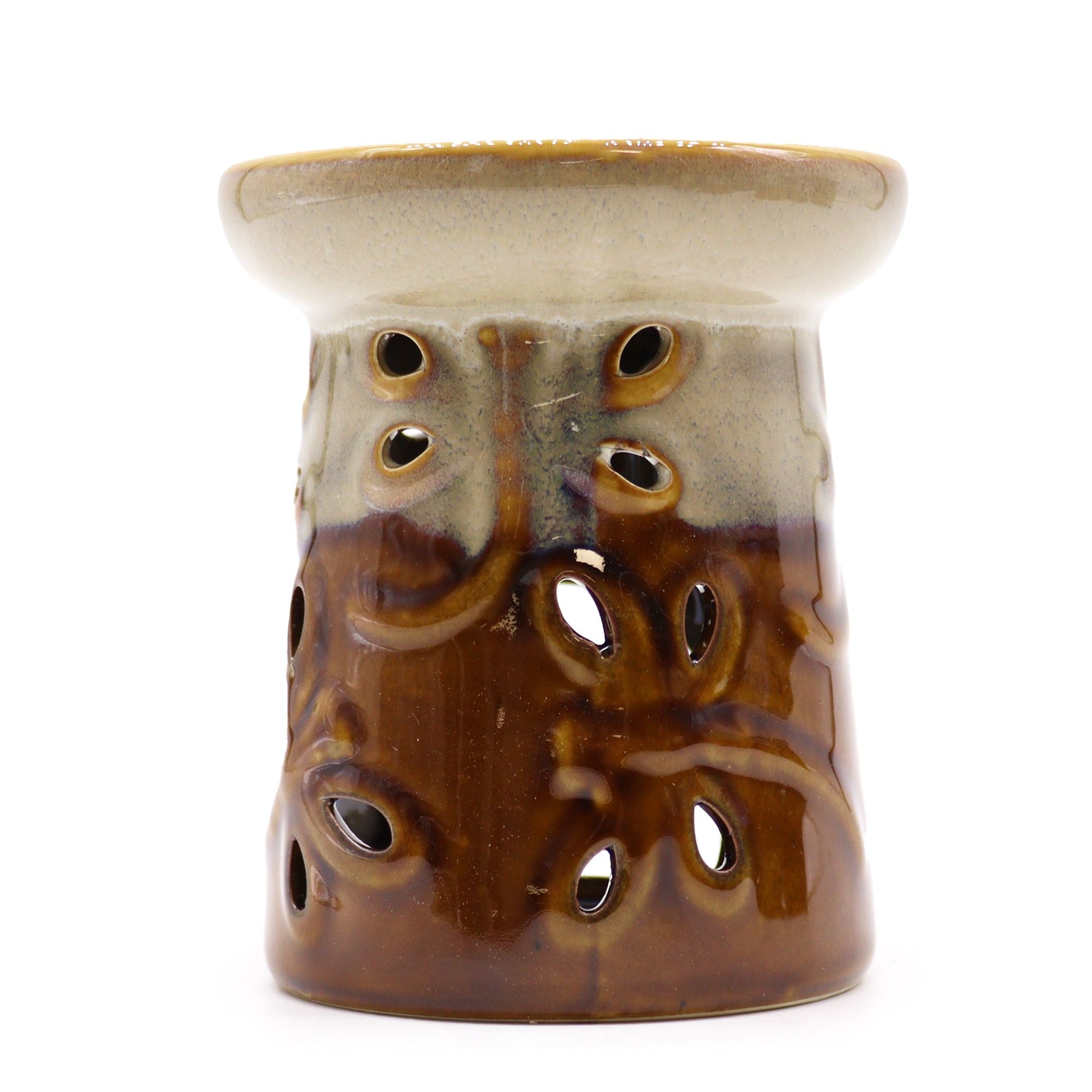 Rustic terracotta-style ceramic oil burner featuring an embossed dragonfly design with a deep bowl for fragrance oils.
