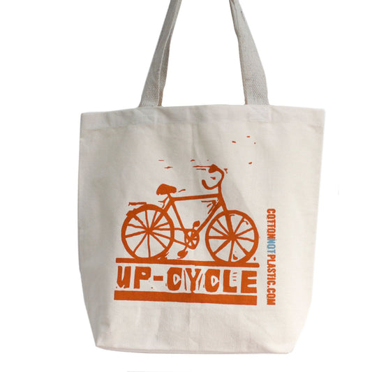 Sustainable large cotton tote bag with long handles shown in a neutral eco-friendly style.