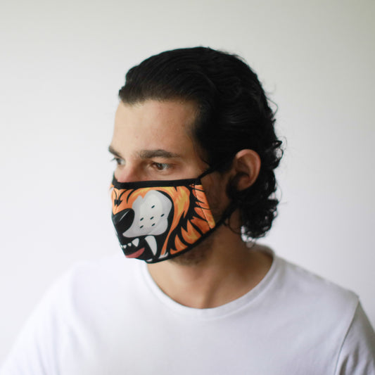 Adult-sized fabric face mask featuring a vibrant and detailed orange and black tiger stripe pattern.