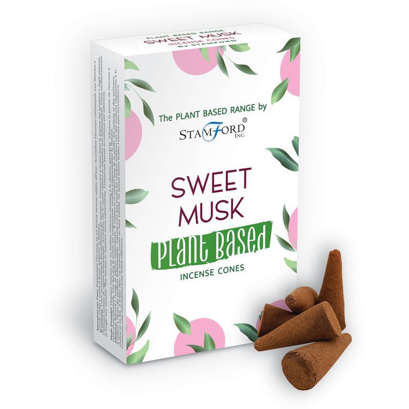 Pile of dark brown plant-based incense cones with a smooth texture on a neutral background.