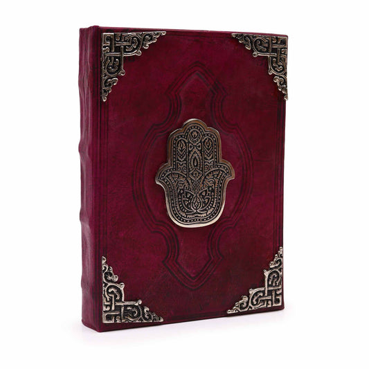 Large red and tan leather journal featuring a silver-toned metal Hamsa Hand decoration on the cover with deckle-edge paper.