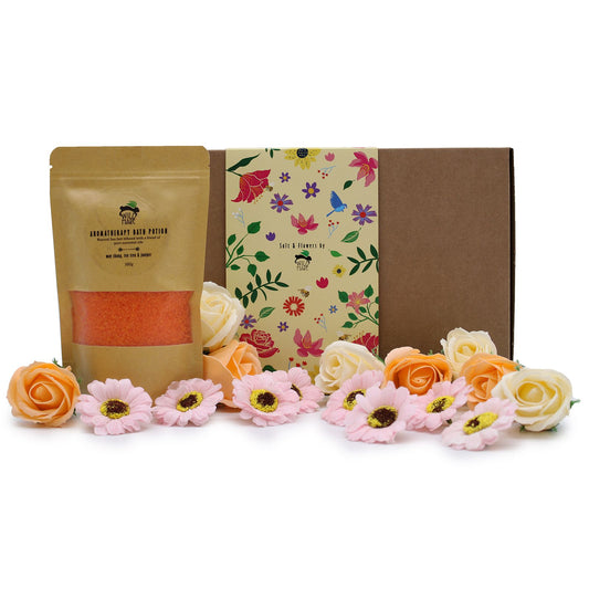 Elegant gift box containing green aromatherapy bath salts and eight delicate matching soap roses.