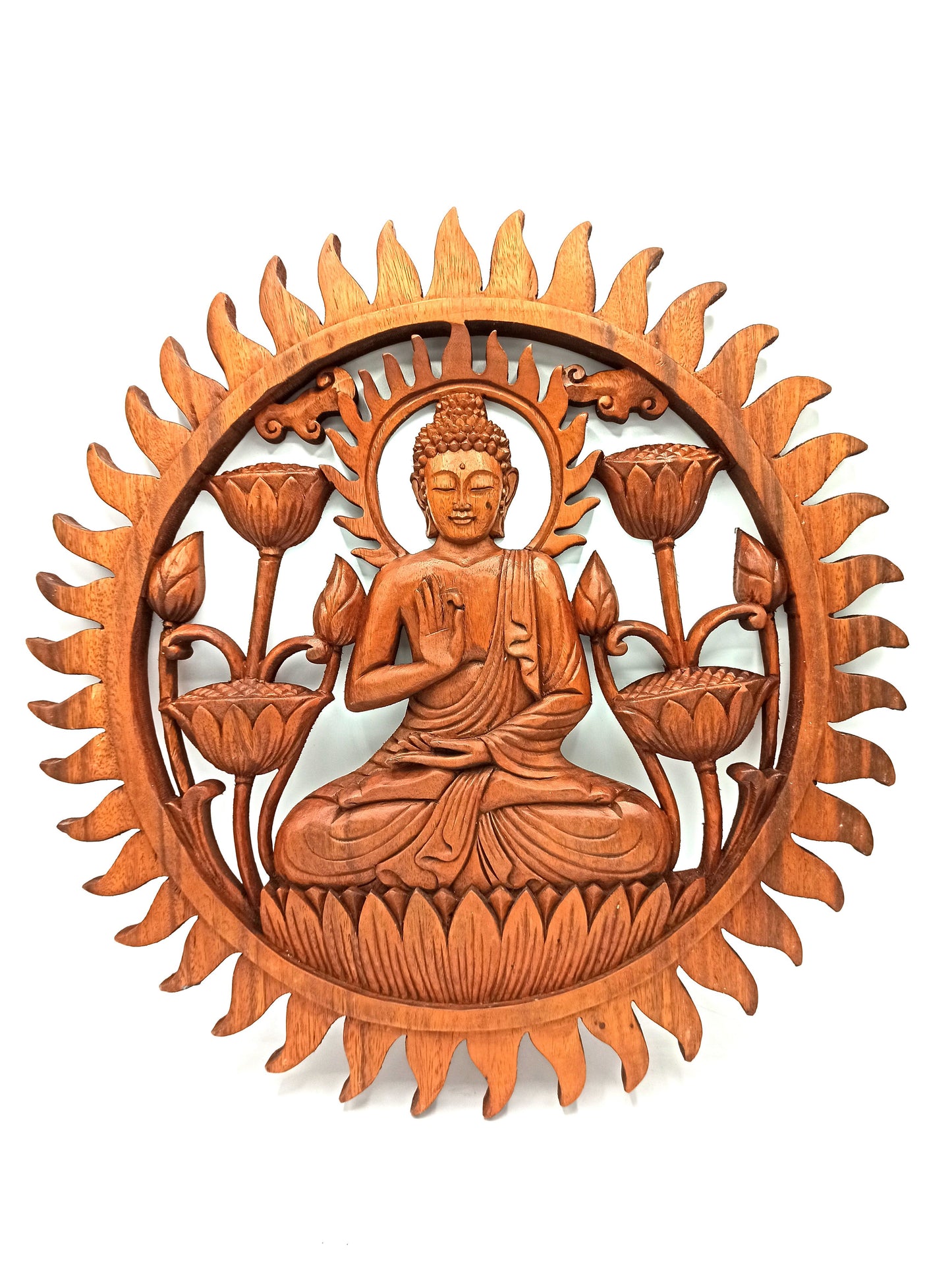Circular hand-carved wooden wall panel featuring a serene Buddha figure seated on a blooming lotus flower.