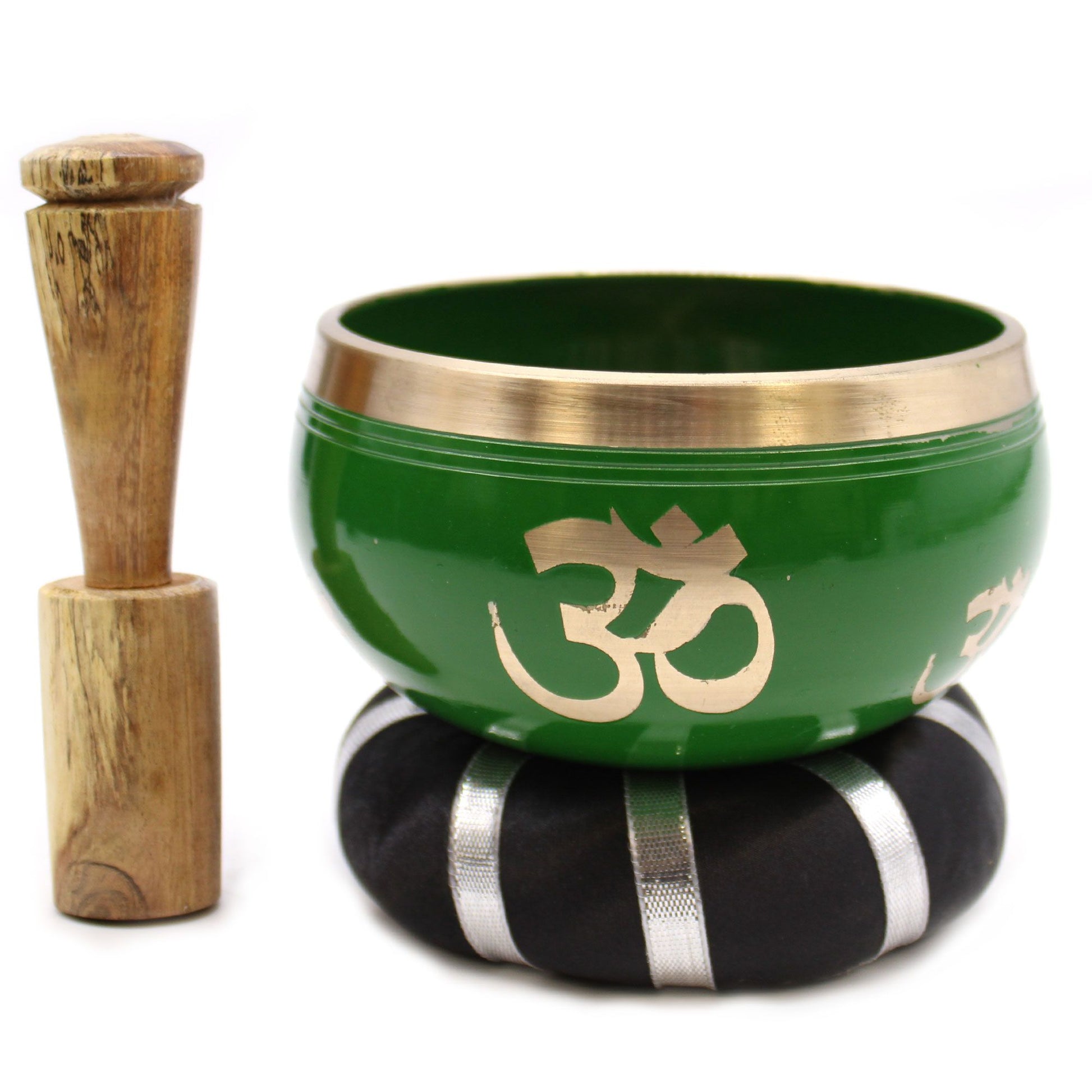Handcrafted green singing bowl with a gold Tree of Life design, resting on a matching cushion with a wooden mallet.