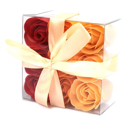 Elegant box containing nine realistic peach-coloured soap roses with delicate petals.