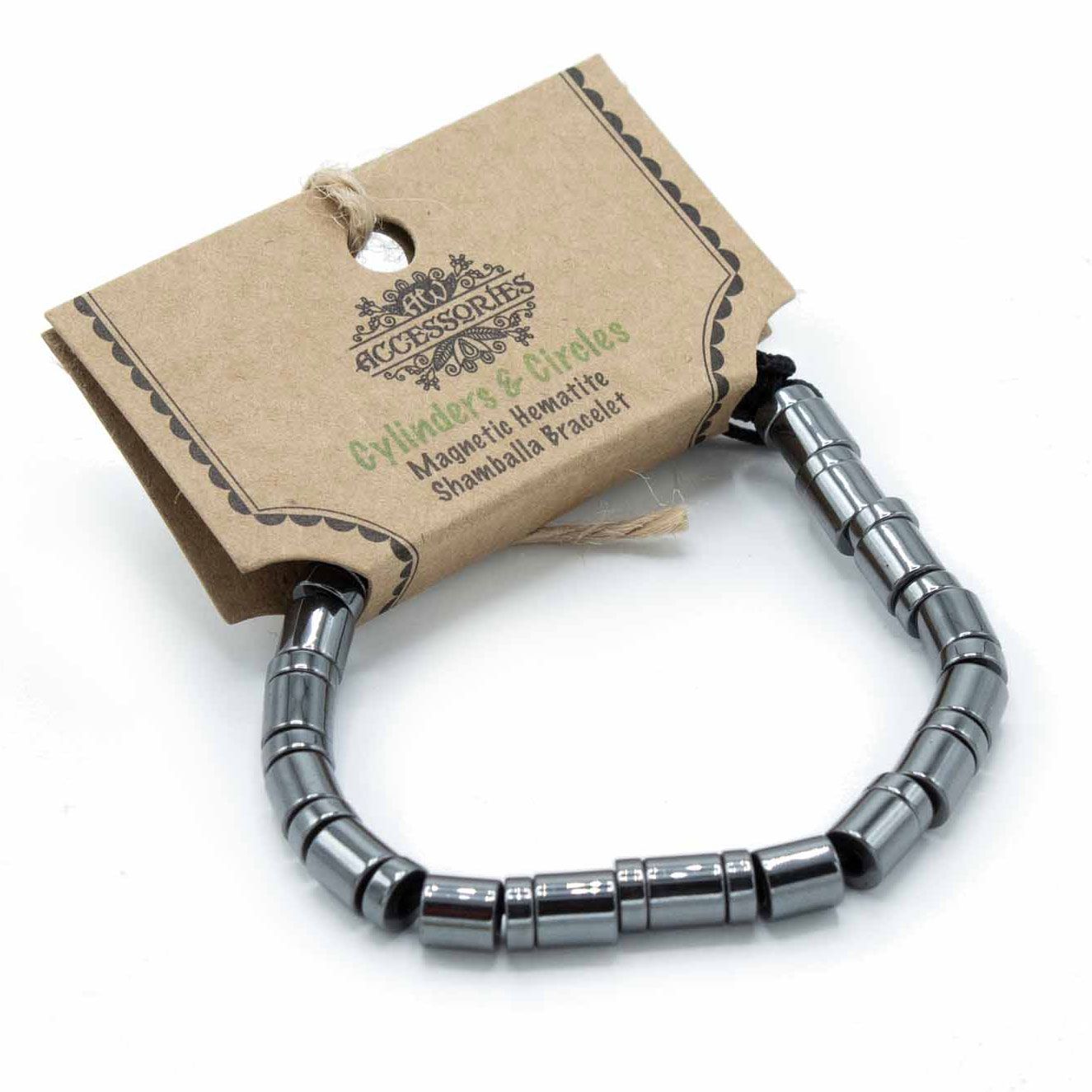 Magnetic hematite shamballa bracelet featuring sleek black beads, cylinders, and circles with subtle colourful accents.
