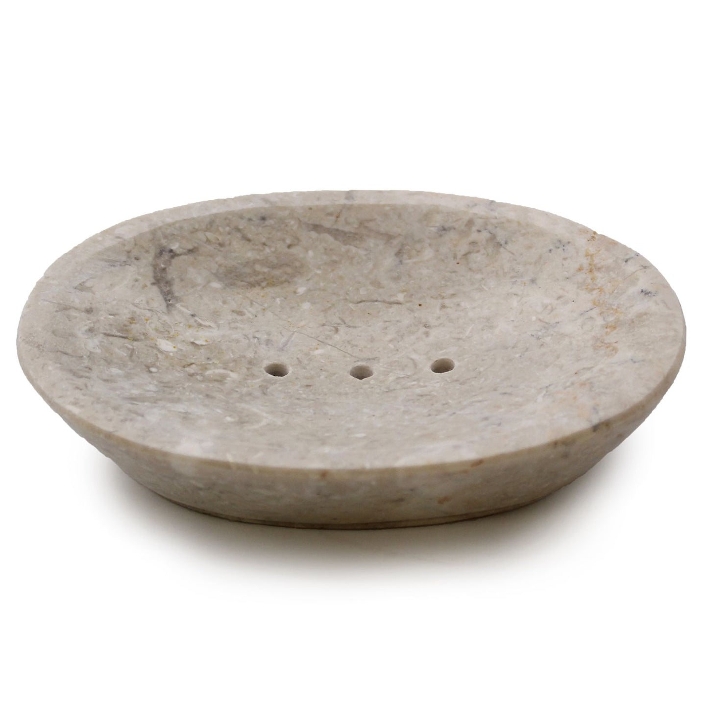 Handmade oval soap dish crafted from smooth cream marble with natural stone veining and drainage holes.
