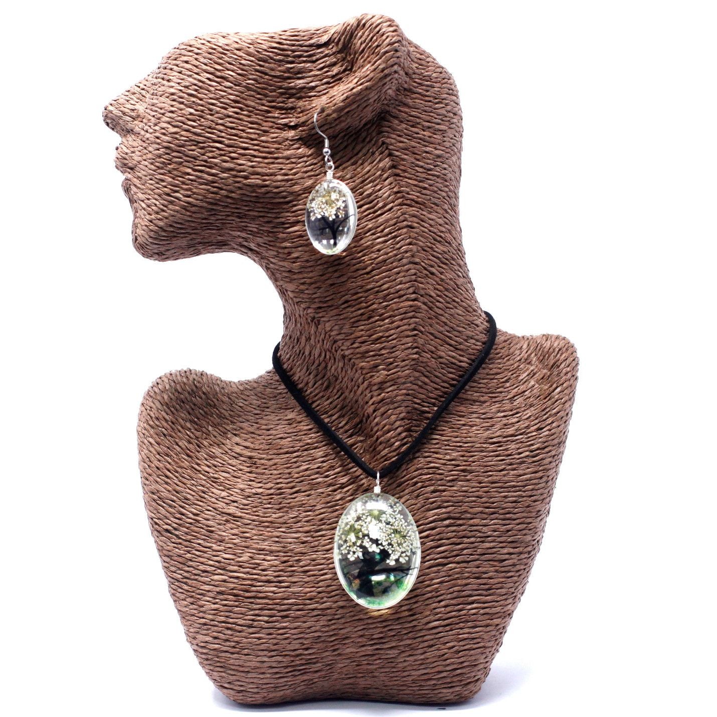 Beautiful necklace and earring set featuring real white pressed flowers within a circular Tree of Life glass pendant.