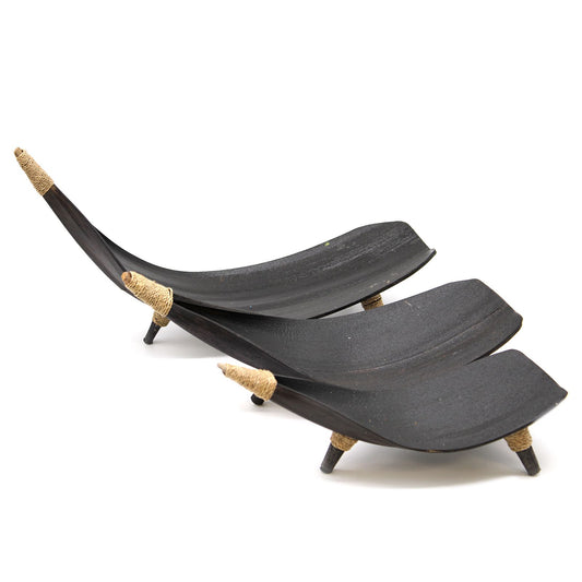 Handcrafted coconut leaf fruit bowl set with a rich chocolate brown finish arranged in a decorative curve.