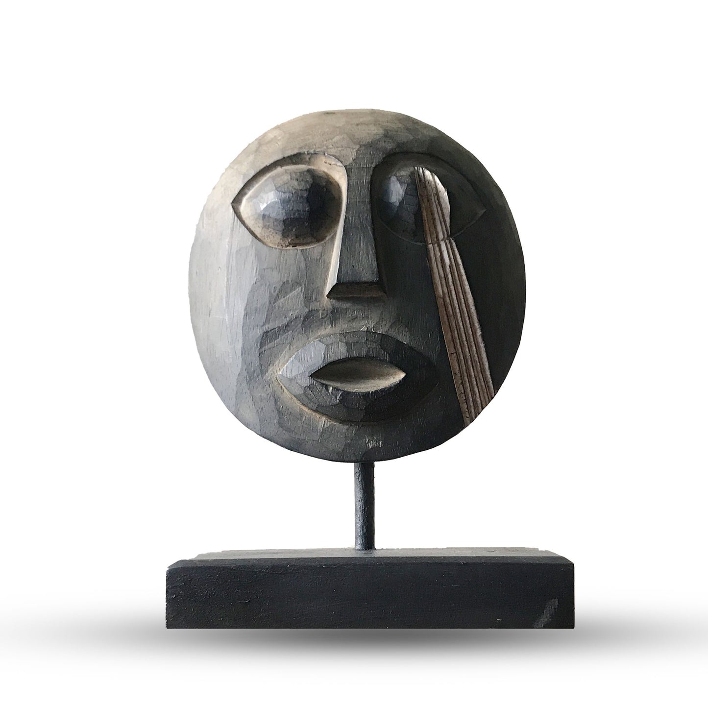Handcrafted wooden Timor tribal mask with detailed carvings and an antique weathered finish on a dark background.