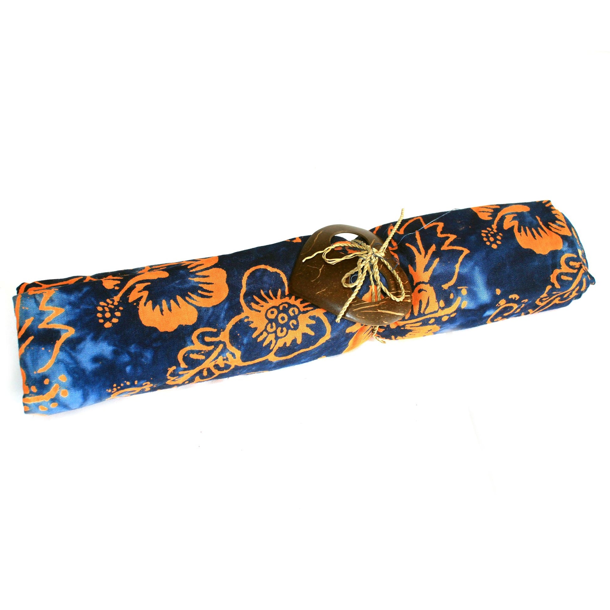 Handcrafted cotton sarong with a tropical block print pattern in vibrant blue and orange hues.