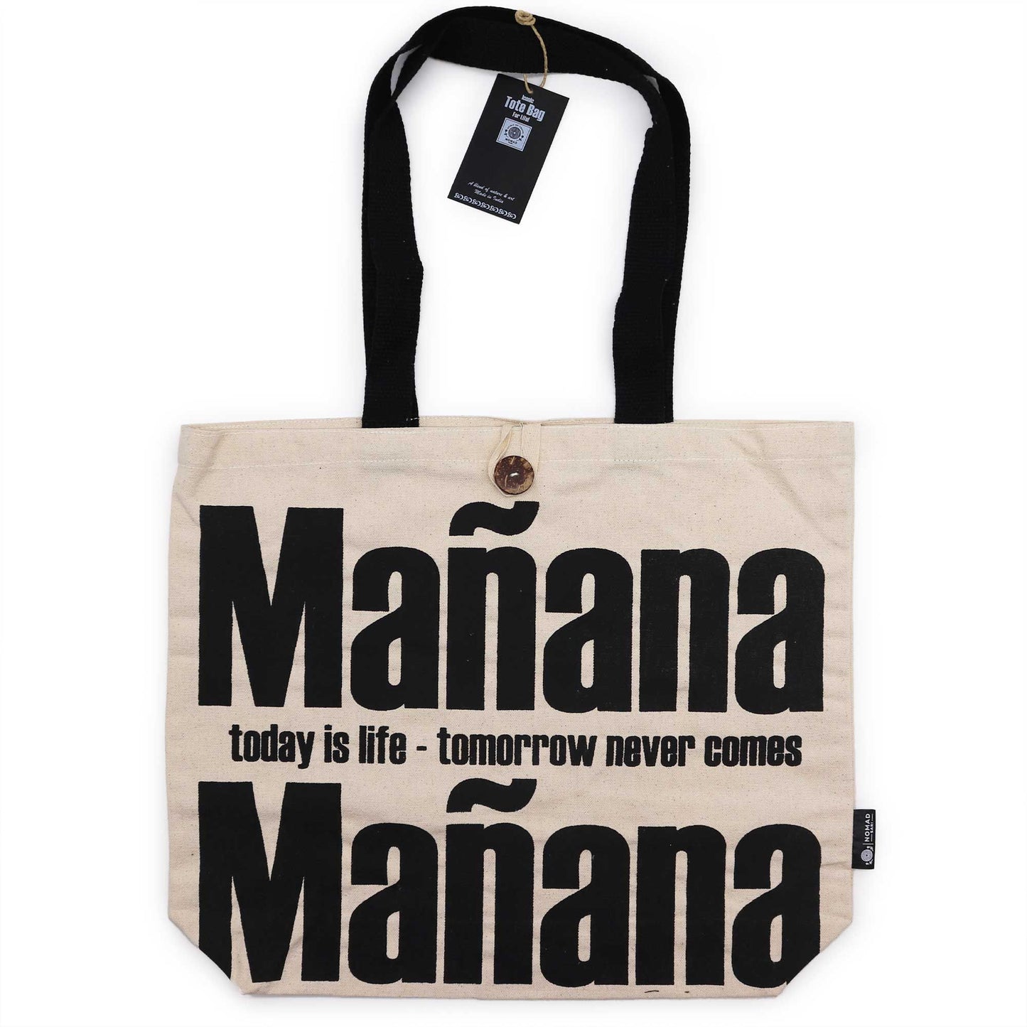 Natural cream-coloured cotton canvas tote bag featuring a minimalist Manana Manana typographic design.