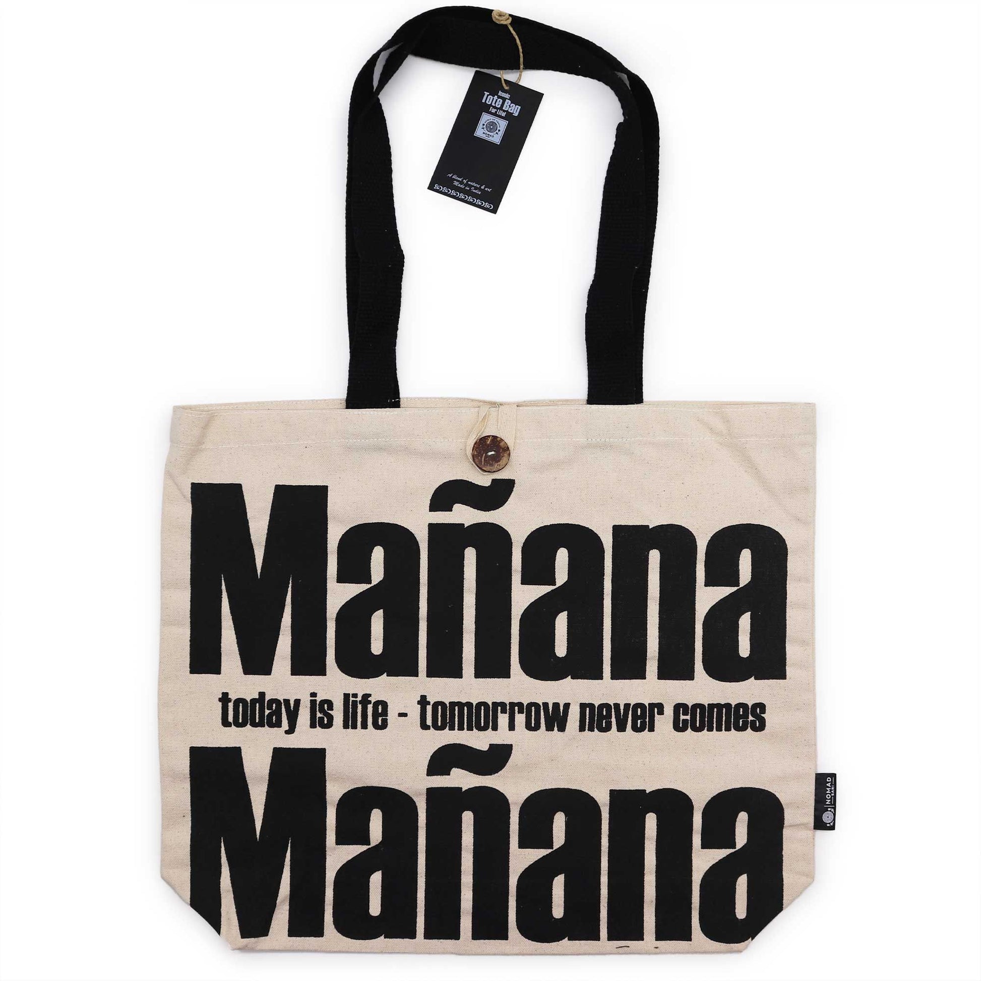 Natural cream-coloured cotton canvas tote bag featuring a minimalist Manana Manana typographic design.
