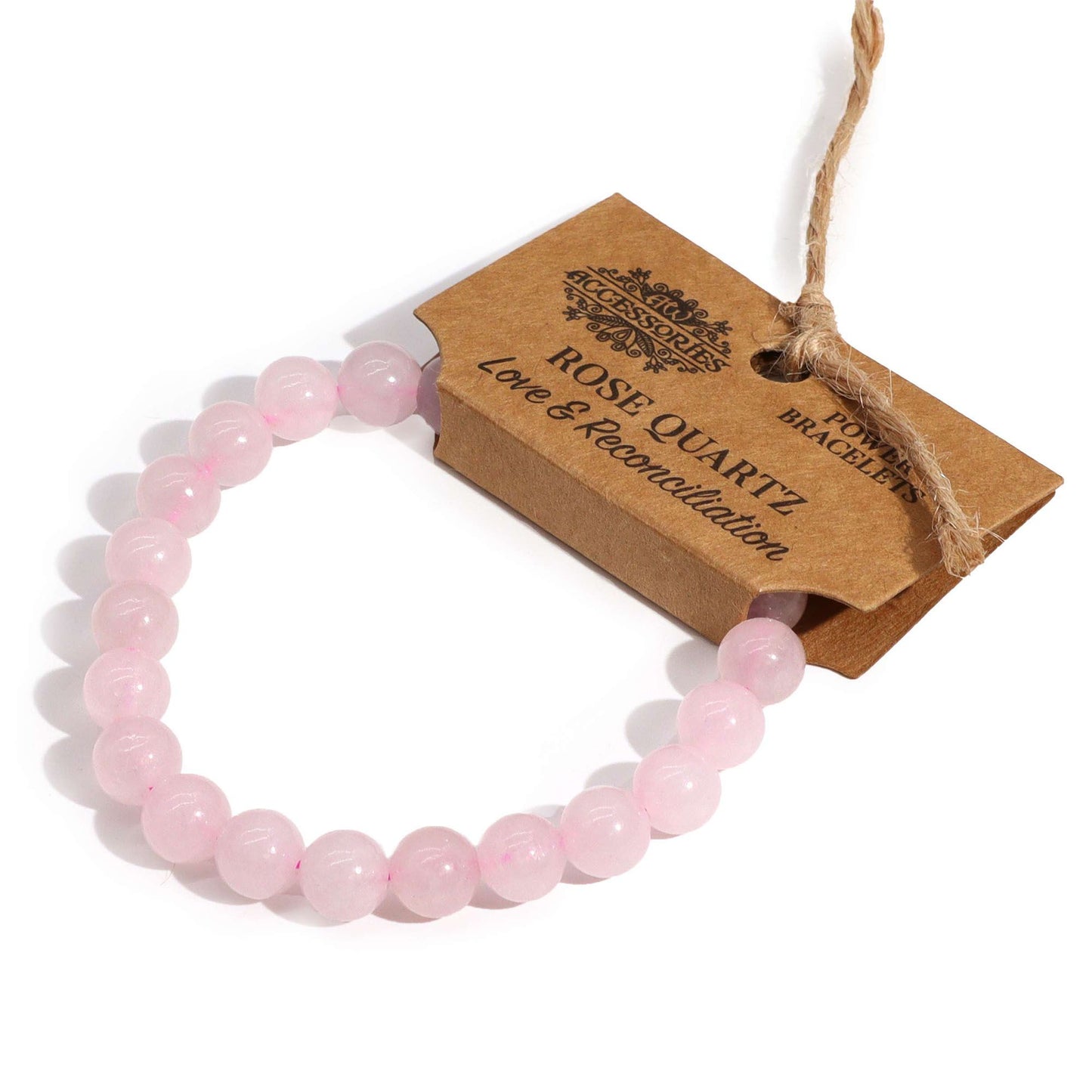 Close-up of a pink rose quartz beaded power bracelet on a neutral background.